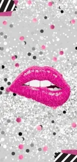 Bright pink glitter lips on a sparkly gray background.