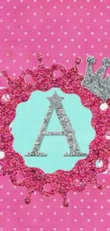 Sparkly pink monogram wallpaper with a crown and polka dots.