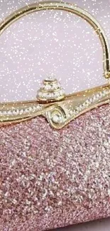 Sparkly pink purse with gold accents as a phone wallpaper.