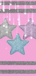 Pink wallpaper with three glittery stars in silver, purple and blue.