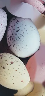 Close-up of speckled pastel Easter eggs for mobile wallpaper.