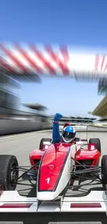 Blurred Formula 1 racing cars on a track with vibrant motion effect.