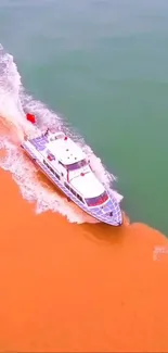 Speedboat cruises along a vibrant sandy shoreline.