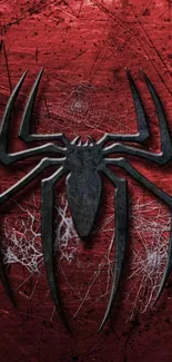 Spider emblem on dark red background with web details.