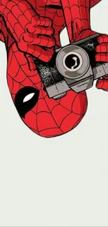 Spidey character with camera on phone wallpaper.