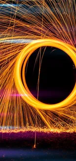 Dynamic spiral sparks with vibrant orange light trails on a black background.