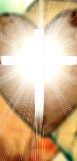 Hands reaching toward a glowing cross with heart background.