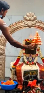 Spiritual temple ritual with vibrant decor and offerings.