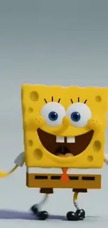 SpongeBob SquarePants smiling in mobile wallpaper.