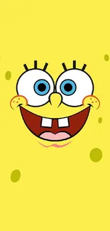 Cheerful SpongeBob face on vibrant yellow background.