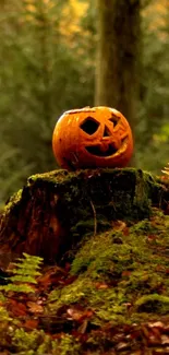 Carved pumpkin on mossy stump in forest setting with autumn leaves.