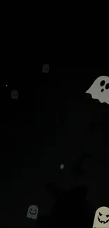 A dark wallpaper featuring cute spooky ghosts floating on a black background.