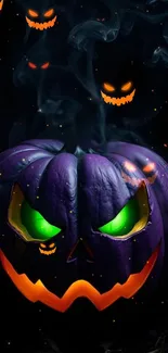 A spooky glowing pumpkin with green eyes for Halloween wallpaper.