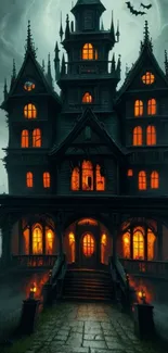 Gothic haunted house with glowing windows and bats in a spooky atmosphere.