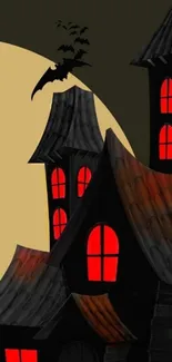 Spooky castle with red windows and bat on Halloween night.