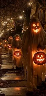 Halloween ghost parade with glowing pumpkins on a dimly lit path.