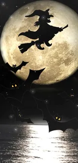 Witch flying across full moon with bats in the night sky.