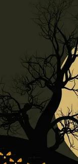 Spooky tree and moon Halloween wallpaper with jack-o'-lanterns.