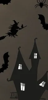 Spooky Halloween night with bats, witch, and haunted house.