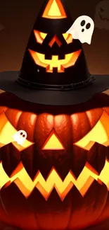 Halloween wallpaper featuring a glowing pumpkin with a witch hat and ghosts.