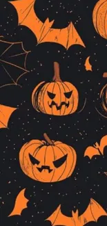 Spooky Halloween wallpaper featuring pumpkins and bats.