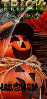 Halloween pumpkin mobile wallpaper with cobwebs and autumn leaves.