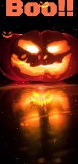 Spooky glowing pumpkin wallpaper with Boo text.