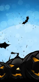 Halloween wallpaper with pumpkins, bats, and a blue night sky.