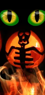 Spooky pumpkin and skeleton with green eyes and flames.