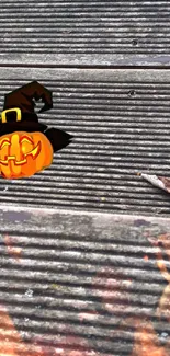 Halloween pumpkin with witch hat on wooden background wallpaper.