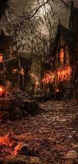 Spooky Halloween village with eerie lighting and pumpkins.