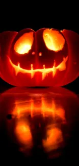 Glowing jack-o'-lantern on a dark background showing an eerie Halloween theme.