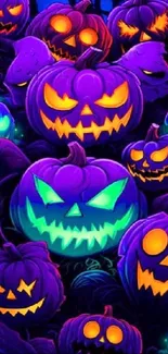 Neon glowing pumpkins in a Halloween-themed mobile wallpaper.