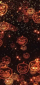 Glowing pumpkin faces on a starry Halloween background.