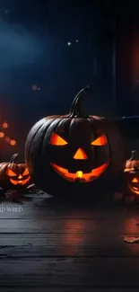 Spooky Halloween pumpkins with glowing faces in the night.