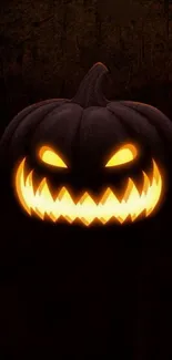 Spooky glowing pumpkin wallpaper for mobile.