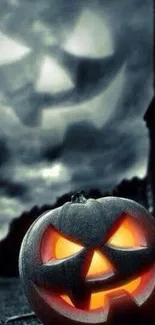 Glowing pumpkin in dark stormy night sky for Halloween wallpaper.