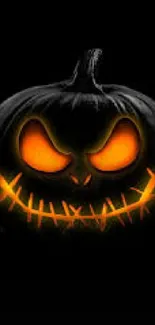 Spooky pumpkin with glowing eyes on a dark background, perfect for Halloween.