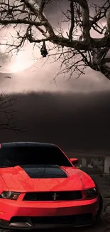 Red sports car under a spooky night sky with moonlight.