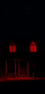 Eerie dark house with red illuminated windows in a spooky mobile wallpaper.