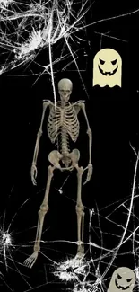 Skeleton with ghost on a spooky black background wallpaper.