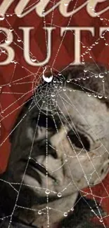 Masked figure behind spider web on red background.