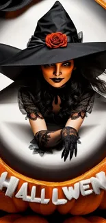 Halloween witch in hat with pumpkin decoration.