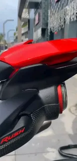 Sport motorcycle tailpiece with red accent.