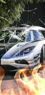 Sports car with shattered glass and flames, creating a dynamic wallpaper.