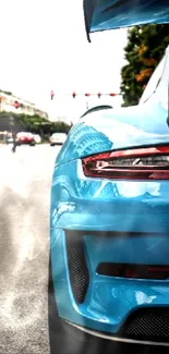 Blue sports car on city street wallpaper.