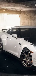 Sporty white car in a dimly lit garage setting wallpaper.