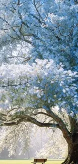 A serene spring blossom tree with blue and white hues in a peaceful park setting.
