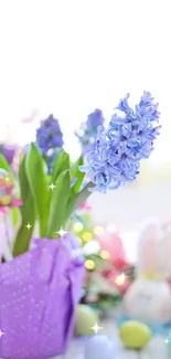 Purple hyacinths and Easter decorations in a spring display.