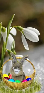 Snowdrops with a bunny and Easter eggs in a serene snowy setting.